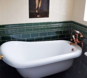 Victorian Green Period Embossed tiles in a bathroom